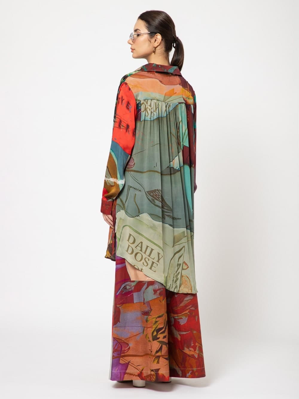 Nstalgia campaign model in the Daily Dose print shirt-dress, rear view