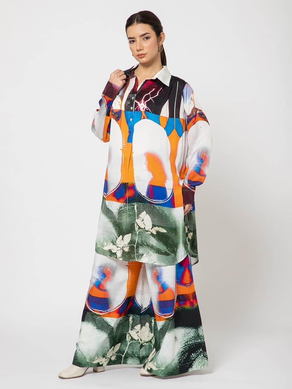 Nstalgia campaign model in the Daily Dose print shirt-dress and trousers, front view